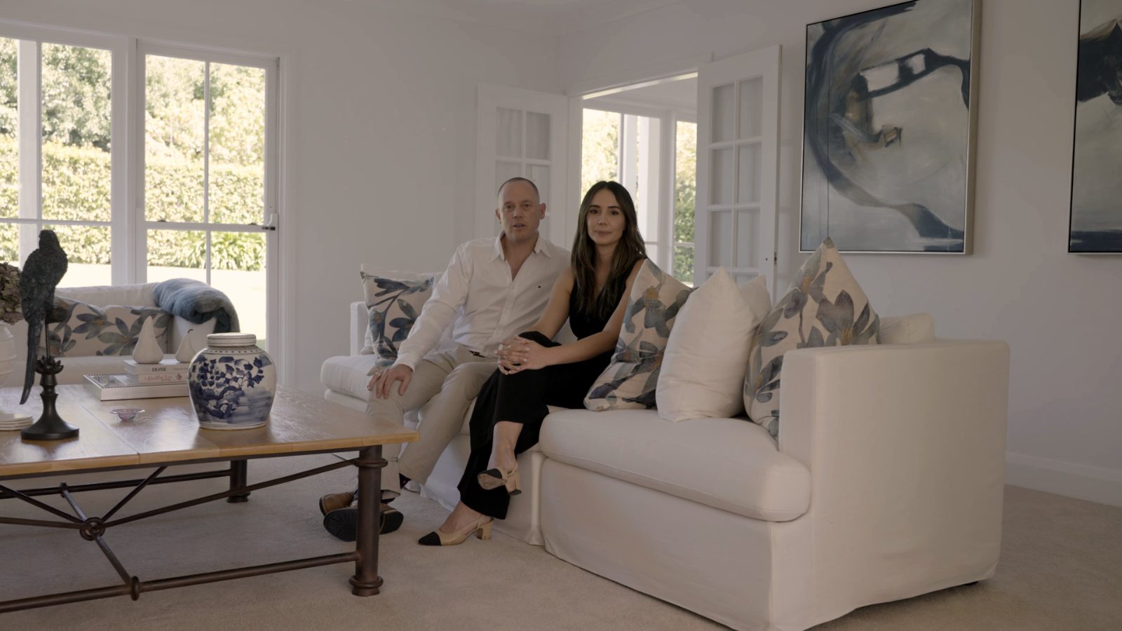 Dea and Mike Manassen in a client's living room
