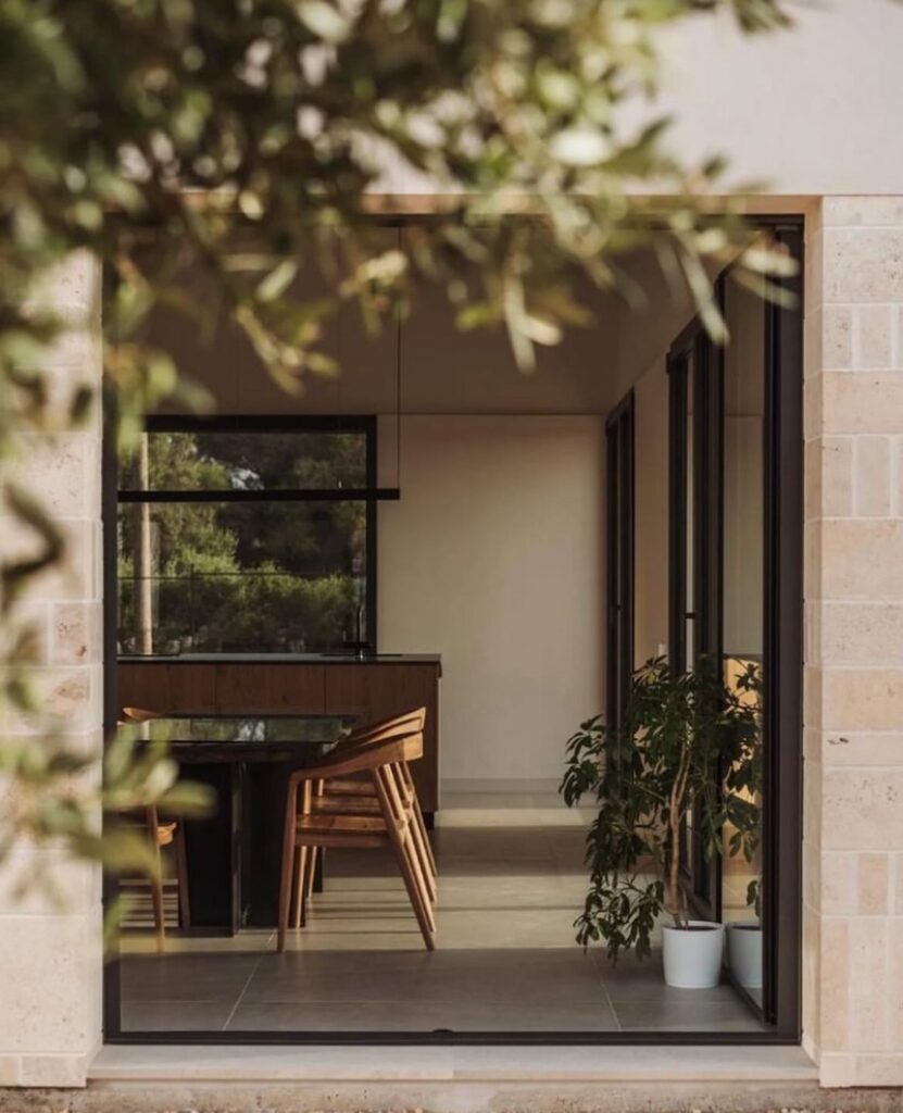 Interior doorway opening onto a garden