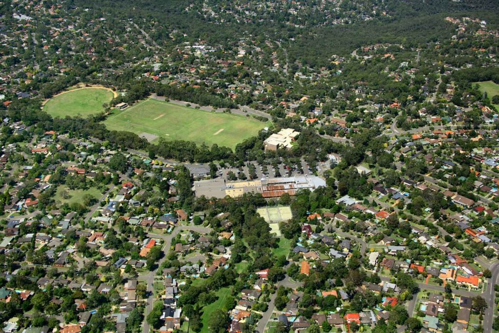 Aerial view of a leafy Northern Beaches suburb